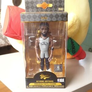 Funko Gold Kyrie Irving Figure in Black and Gray